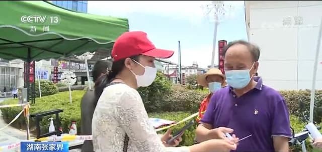 抗击“疫”情 基层工作者显担当:坚守一线 守护安全